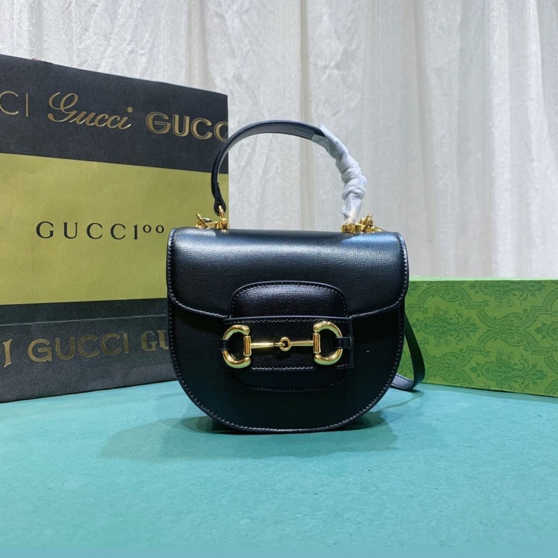 G*u*i top handle bags